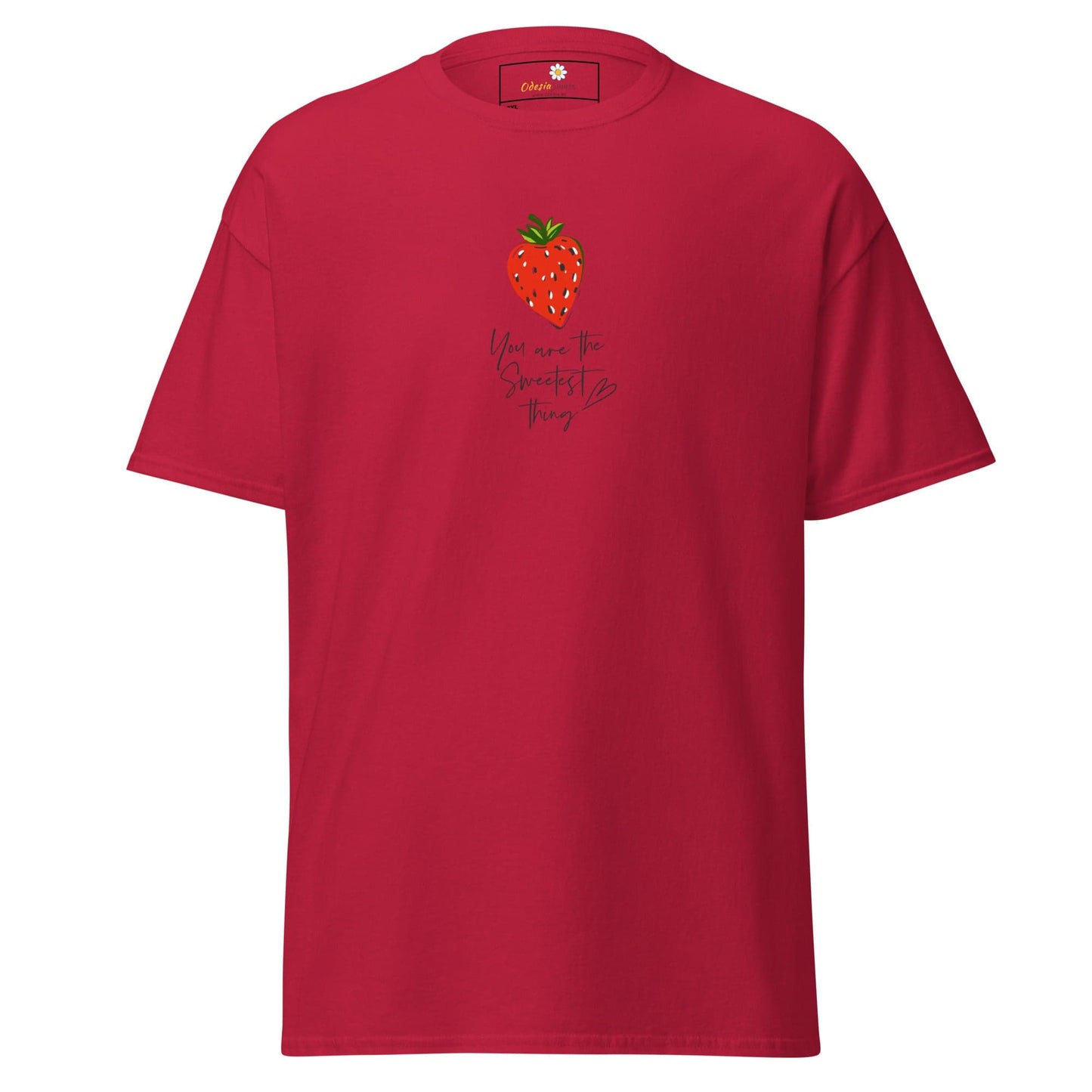 Red t-shirt with strawberry graphic.