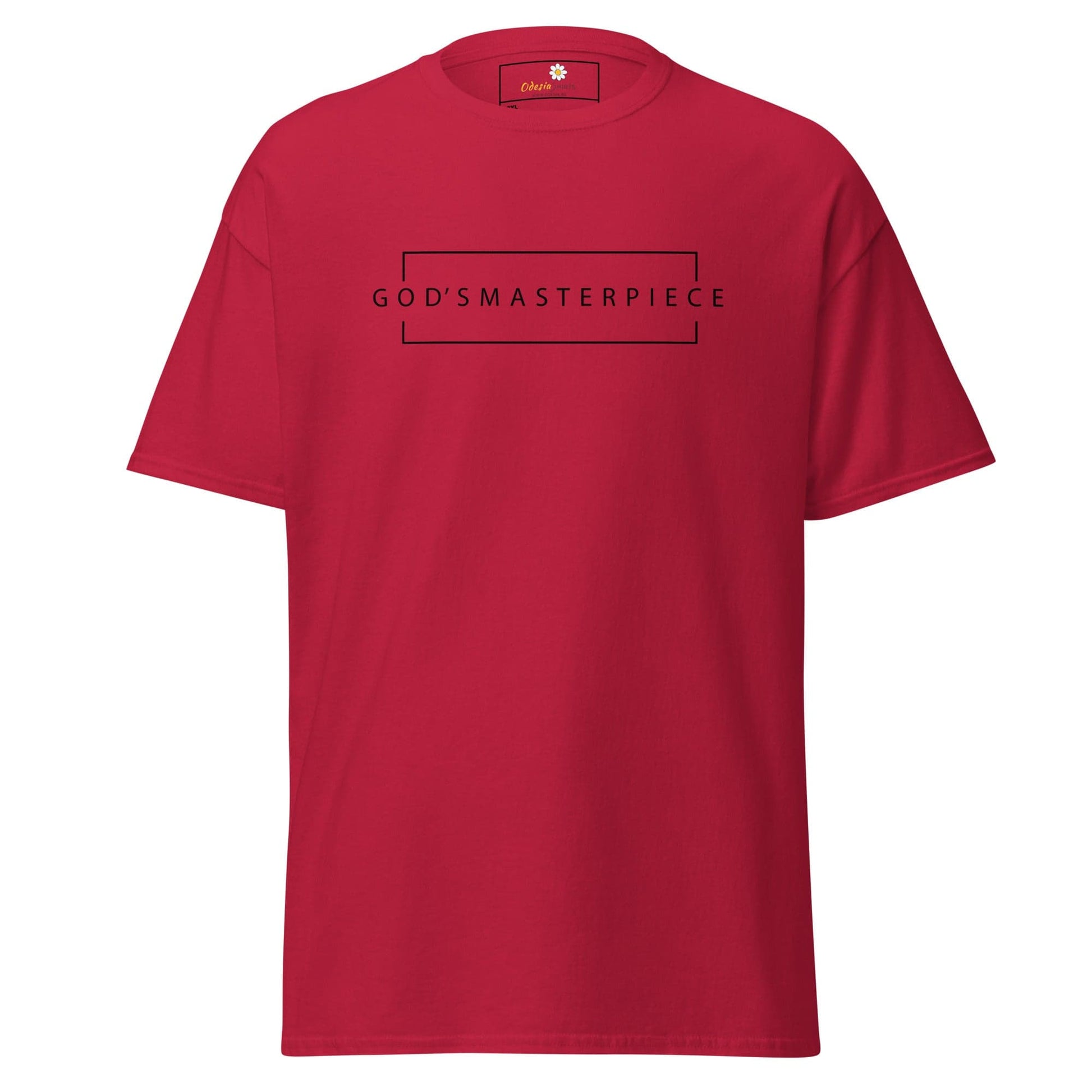 Red t-shirt with ’God’s Masterpiece’ graphic.