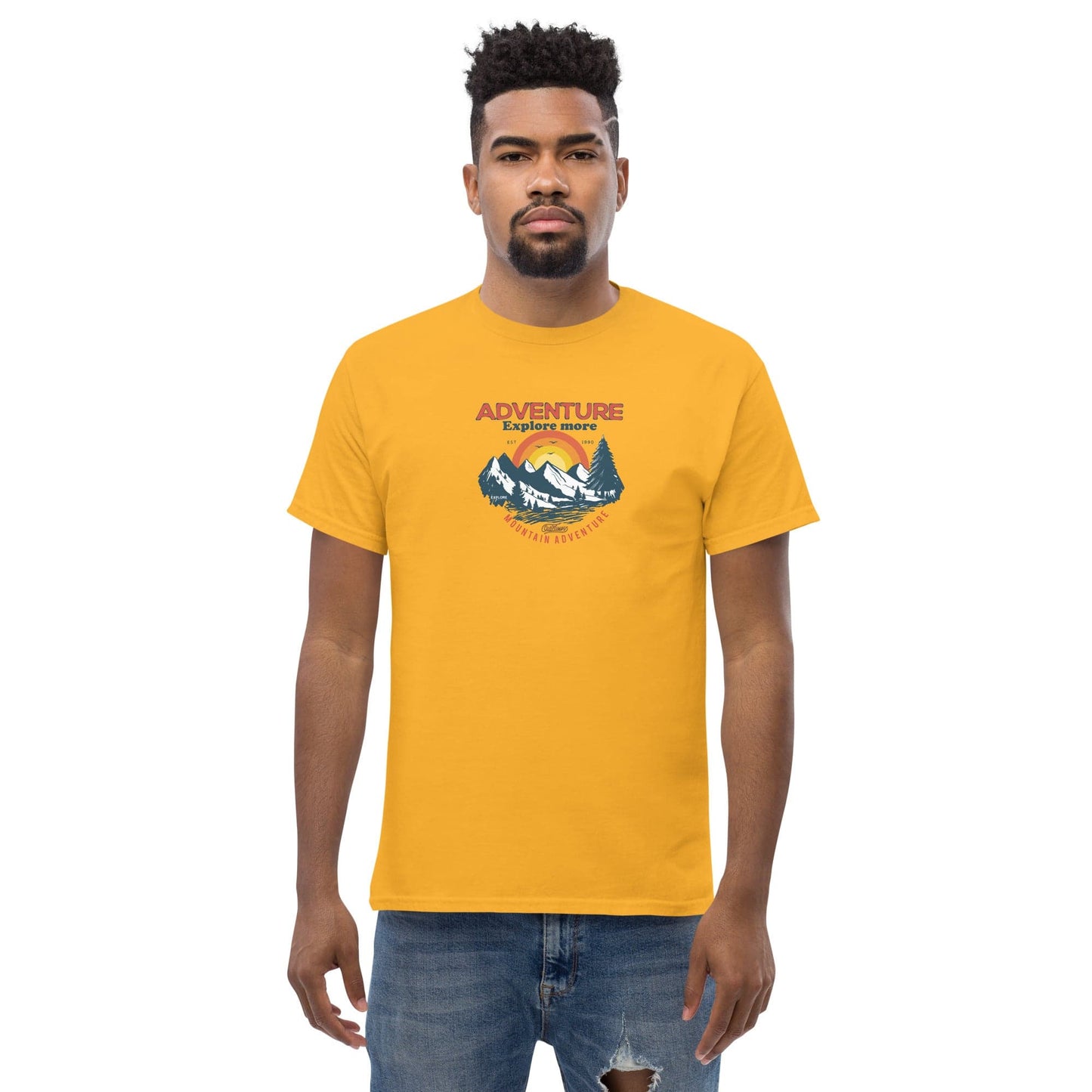 Yellow t-shirt with mountain graphic.